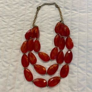 Red statement necklace